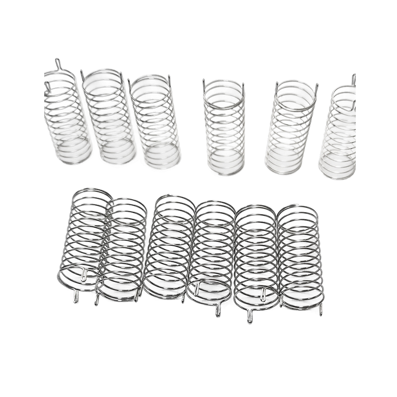 How can switch button compression springs maintain wear resistance and provide long-lasting tactile feedback in high-frequency applications like bicycles and toys?